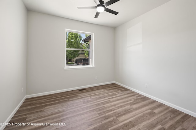 964 E 17th St, Rifle, CO 81650 - empty room with a ceiling fan, wood finished floors, and baseboards