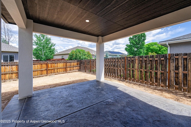 964 E 17th St, Rifle, CO 81650 - fenced backyard featuring a patio area