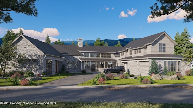 956 Bald Eagle Way, Carbondale, CO 81623 - view of front of house with stone siding, a chimney, and a front lawn