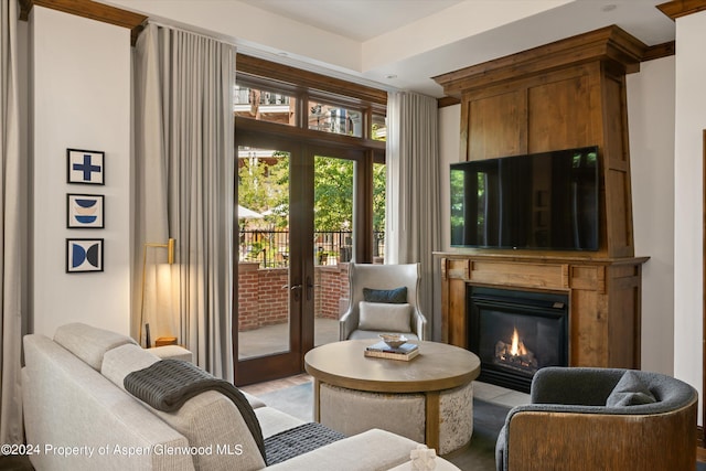 doorway with a large fireplace and french doors