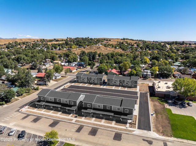 750 Tucker St, Craig, CO 81625 - drone / aerial view with a mountain view and a residential view