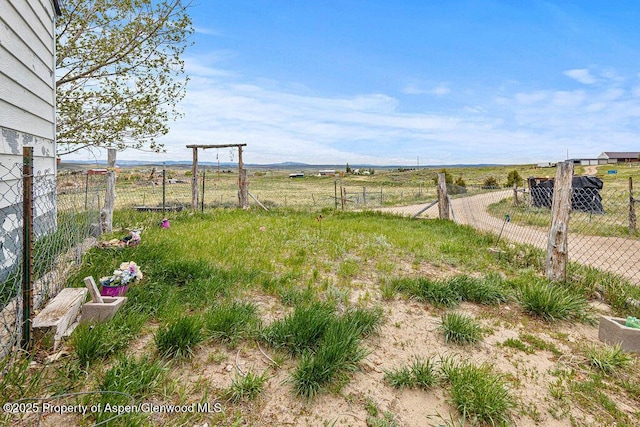 194 Hill Dr, Craig, CO 81625 - view of yard featuring fence and a rural view