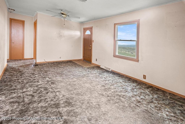 194 Hill Dr, Craig, CO 81625 - carpeted spare room with crown molding, ceiling fan, and baseboards
