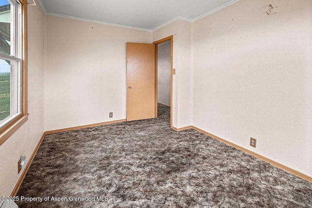 194 Hill Dr, Craig, CO 81625 - carpeted empty room featuring baseboards and ornamental molding
