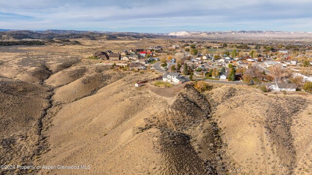 bird's eye view with a mountain view