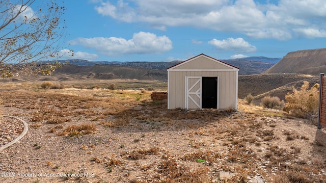 view of outdoor structure featuring a mountain view