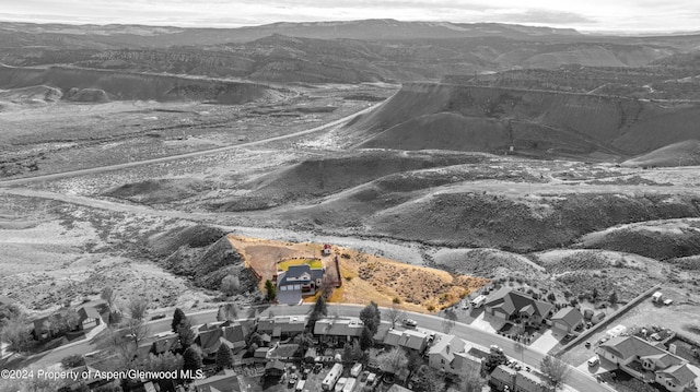 aerial view featuring a mountain view