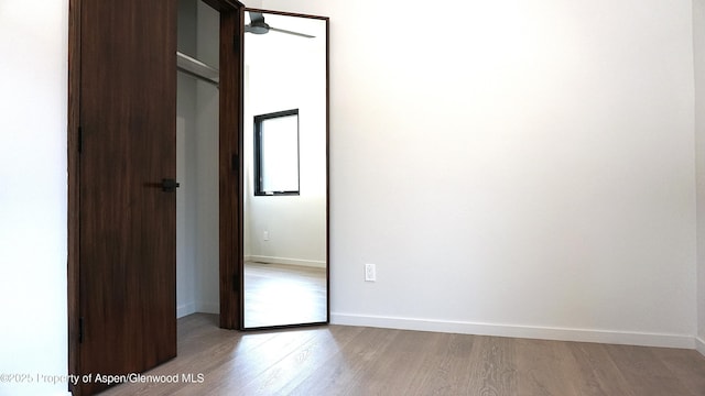 unfurnished bedroom with light wood-type flooring