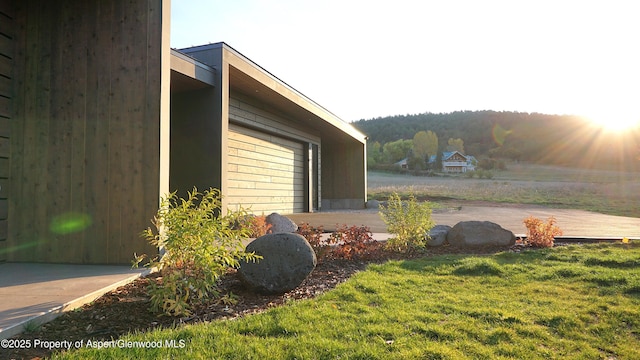 view of property exterior featuring a yard