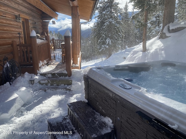 1373 Mclaughlin Ln, Basalt, CO 81621 - snow covered patio featuring a hot tub