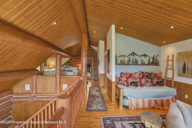 1373 Mclaughlin Ln, Basalt, CO 81621 - bedroom featuring wood ceiling, a wainscoted wall, wood-type flooring, log walls, and recessed lighting
