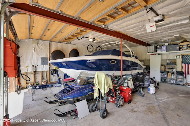 1373 Mclaughlin Ln, Basalt, CO 81621 - garage featuring a garage door opener and electric panel