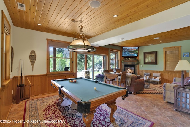 1373 Mclaughlin Ln, Basalt, CO 81621 - rec room featuring a wainscoted wall, wood walls, wood ceiling, pool table, and a glass covered fireplace