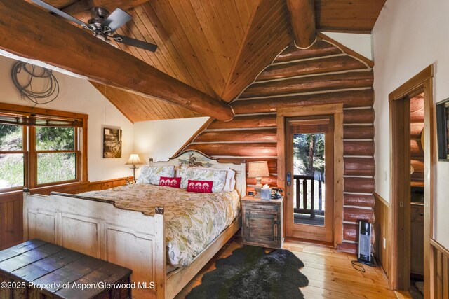 1373 Mclaughlin Ln, Basalt, CO 81621 - bedroom with a wainscoted wall, wooden ceiling, rustic walls, access to exterior, and light wood finished floors