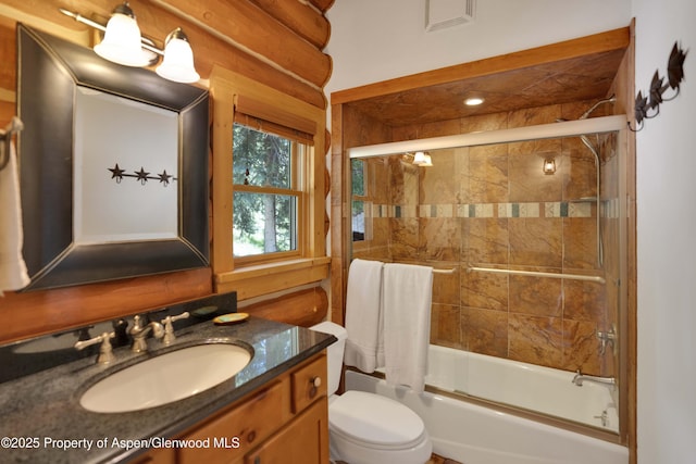 1373 Mclaughlin Ln, Basalt, CO 81621 - full bathroom featuring vanity, toilet, and bath / shower combo with glass door