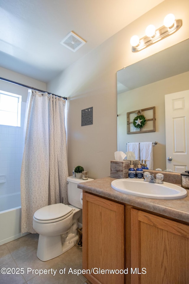 41 Red Cloud Ct, New Castle, CO 81647 - bathroom featuring toilet, vanity, tile patterned flooring, and shower / bath combination with curtain