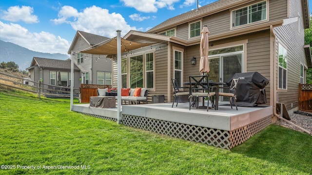 41 Red Cloud Ct, New Castle, CO 81647 - back of house featuring a deck with mountain view