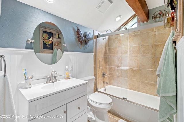 bathroom featuring visible vents, lofted ceiling with beams, a wainscoted wall, and vanity