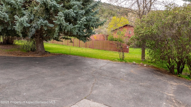 view of patio featuring fence