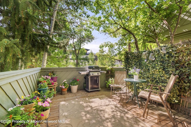 125 E Hyman Ave Unit 1A, Aspen, CO 81611 - view of patio with grilling area and a deck
