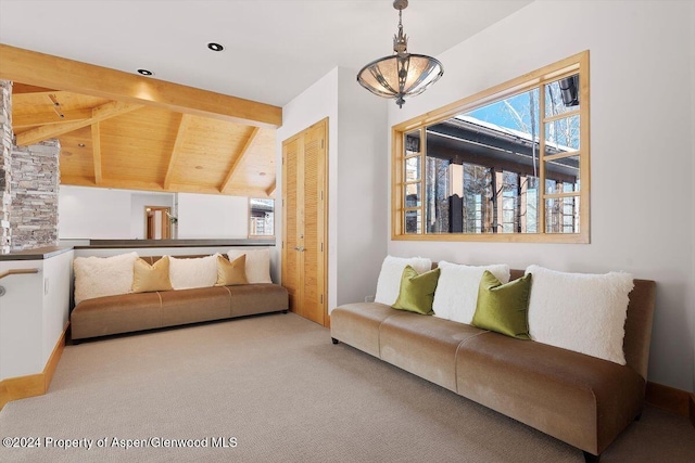 carpeted living room featuring vaulted ceiling with beams and a notable chandelier