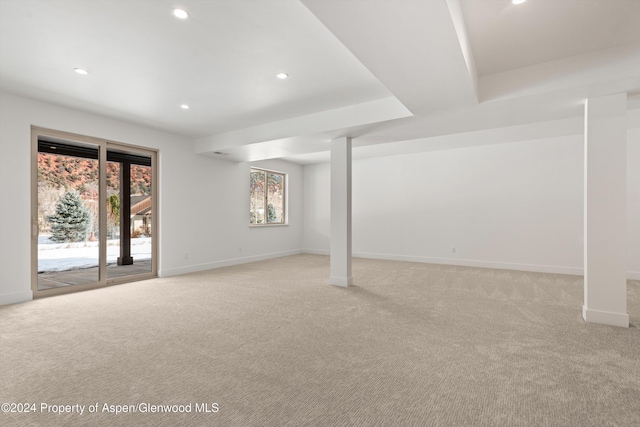 basement with light carpet