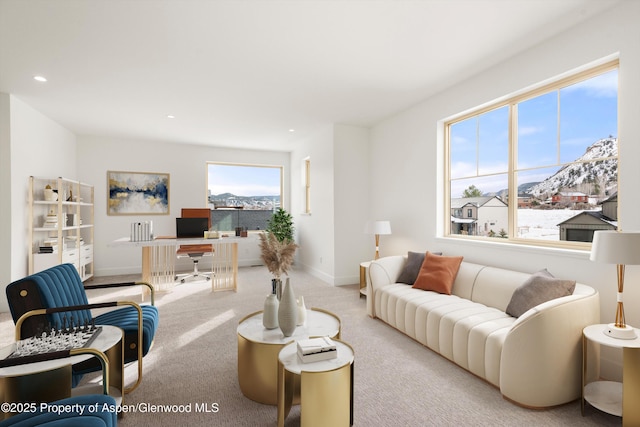 living room featuring light colored carpet