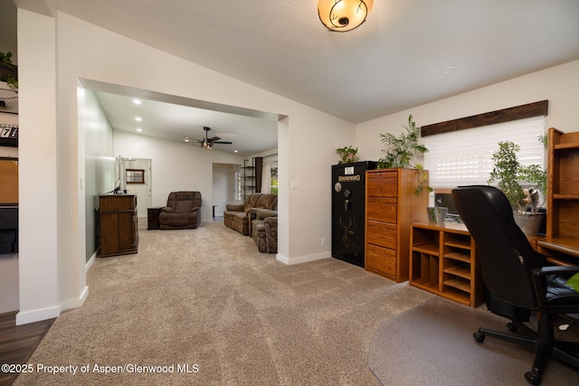 office area featuring vaulted ceiling, a ceiling fan, carpet floors, baseboards, and recessed lighting