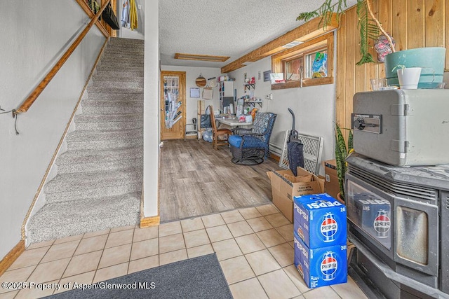 110 Western Ave, Craig, CO 81625 - basement featuring a textured ceiling and tile patterned flooring