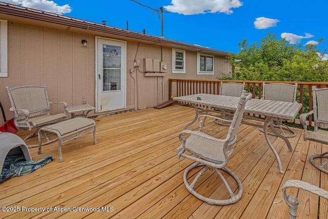 110 Western Ave, Craig, CO 81625 - wooden terrace with outdoor dining area