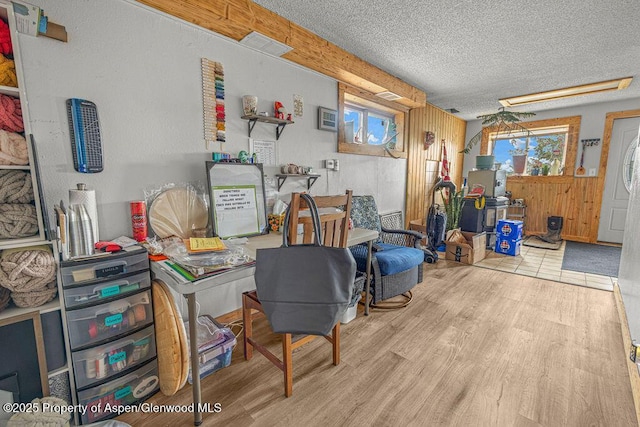 110 Western Ave, Craig, CO 81625 - office area with wood finished floors, plenty of natural light, and a textured ceiling