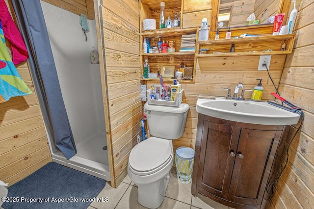 110 Western Ave, Craig, CO 81625 - bathroom with wooden walls, vanity, a shower stall, and tile patterned floors