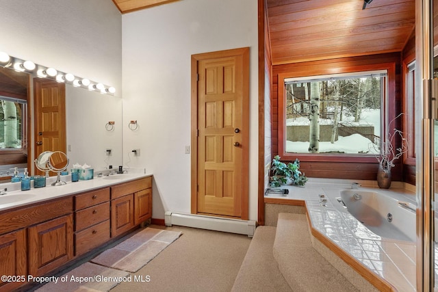 bathroom featuring wooden ceiling, vanity, a washtub, and a baseboard heating unit