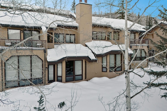 exterior space featuring a balcony