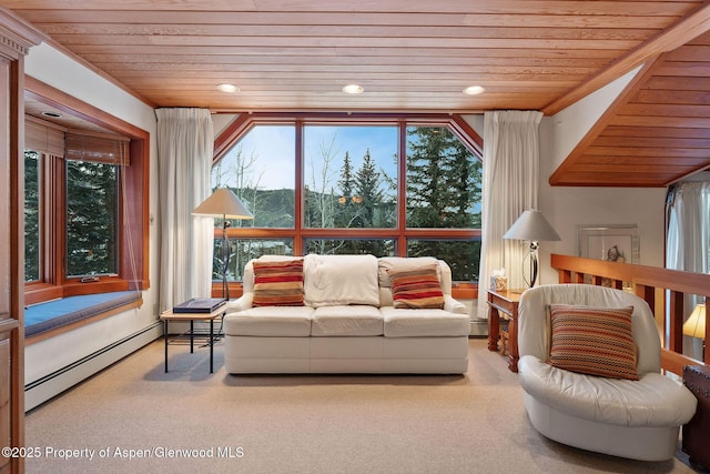 interior space featuring a baseboard heating unit and wooden ceiling