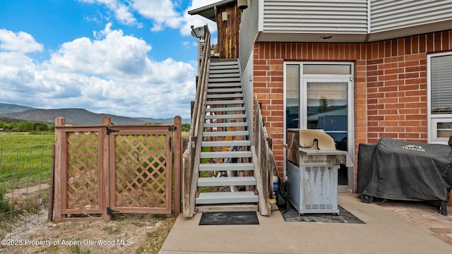1000 Dolores Way Unit C, Carbondale, CO 81623 - doorway to property with brick siding, a mountain view, and a gate