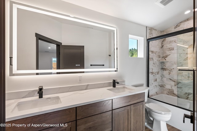 129 Sage Meadow Rd, Glenwood Springs, CO 81601 - bathroom with a sink, double vanity, and a healthy amount of sunlight