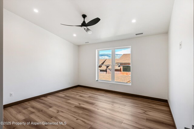 129 Sage Meadow Rd, Glenwood Springs, CO 81601 - spare room featuring a ceiling fan, baseboards, recessed lighting, wood finished floors, and visible vents