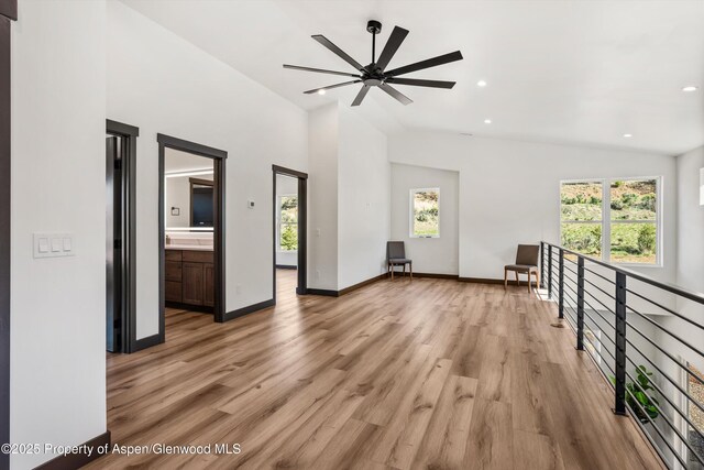 129 Sage Meadow Rd, Glenwood Springs, CO 81601 - unfurnished living room with a ceiling fan, vaulted ceiling, light wood-style flooring, and recessed lighting