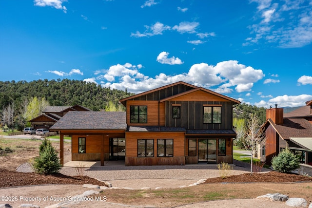 129 Sage Meadow Rd, Glenwood Springs, CO 81601 - rear view of property featuring covered porch