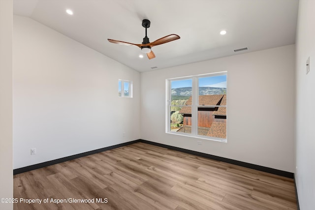 129 Sage Meadow Rd, Glenwood Springs, CO 81601 - spare room with ceiling fan, visible vents, baseboards, wood finished floors, and vaulted ceiling