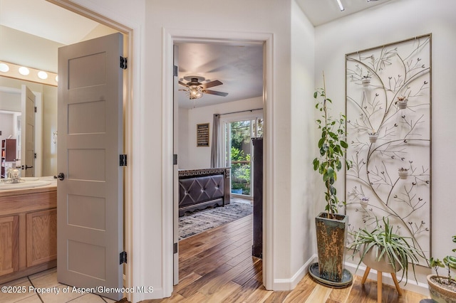 168 Current Dr, New Castle, CO 81647 - foyer featuring light wood-style floors and ceiling fan