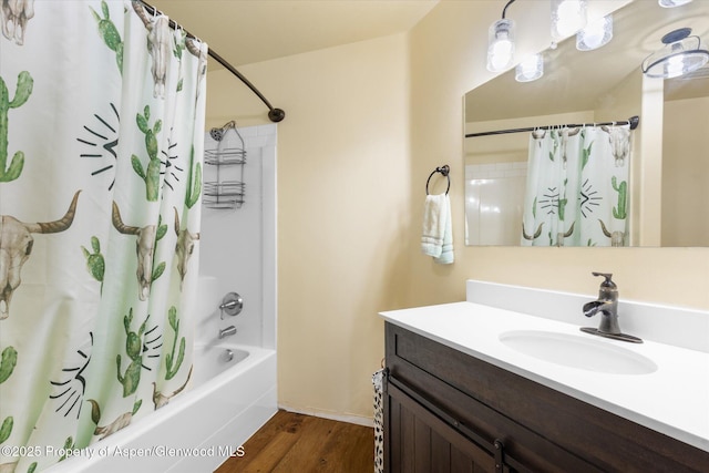 bathroom featuring vanity, wood-type flooring, and shower / bath combo