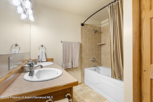 bathroom featuring vanity and shower / bath combo