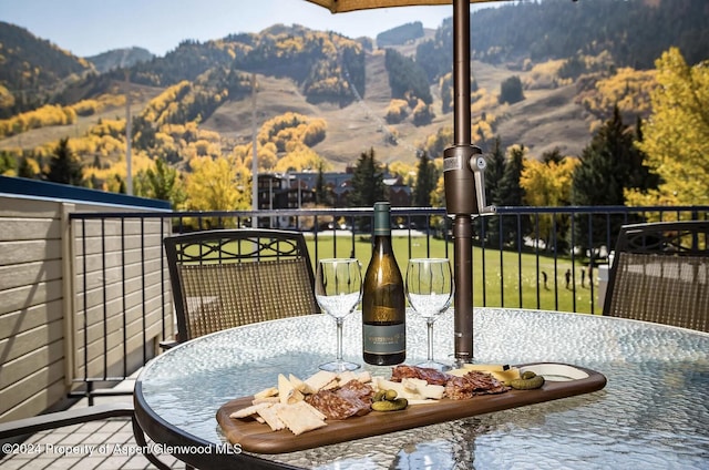 balcony featuring a mountain view