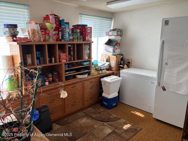 1598 N Yampa Ave, Craig, CO 81625 - miscellaneous room featuring a textured ceiling