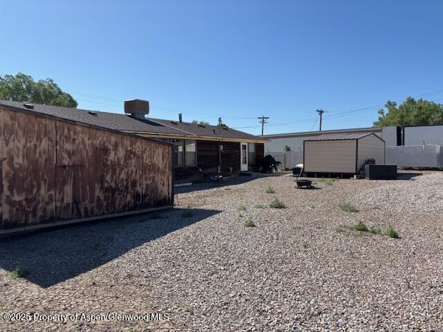1598 N Yampa Ave, Craig, CO 81625 - back of property with a storage unit