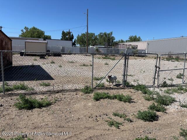 1598 N Yampa Ave, Craig, CO 81625 - view of yard with a gate