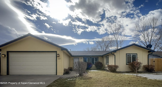 single story home with a garage