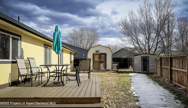 deck featuring a storage shed